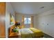 Spacious bedroom with large closet and window at 816 S Esperanza Ave, Mesa, AZ 85208