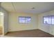 Bright bedroom with wood floors and multiple windows at 816 S Esperanza Ave, Mesa, AZ 85208