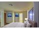 Spacious bedroom featuring a comfortable bed and calming artwork at 816 S Esperanza Ave, Mesa, AZ 85208