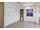 Bright dining room features wood-look floors and a chandelier at 816 S Esperanza Ave, Mesa, AZ 85208