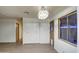View of dining area with wood-look floors, entryway and closet at 816 S Esperanza Ave, Mesa, AZ 85208