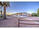 Front view of a single story home with palm trees at 816 S Esperanza Ave, Mesa, AZ 85208
