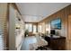 Home office with wood paneling and built-in shelving at 816 S Esperanza Ave, Mesa, AZ 85208