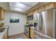 Modern kitchen with stainless steel appliances and wood cabinets at 816 S Esperanza Ave, Mesa, AZ 85208