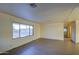 Living room featuring hardwood floors and large window at 816 S Esperanza Ave, Mesa, AZ 85208