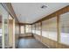 Sunroom with wood paneling and large windows at 816 S Esperanza Ave, Mesa, AZ 85208