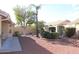 Backyard with gravel, mature trees, and landscaping at 8450 W Rose Pilar Ct, Peoria, AZ 85382