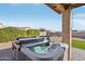 Relaxing hot tub on backyard patio at 8823 N 186Th Ave, Waddell, AZ 85355