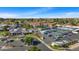 Aerial view of community amenities including clubhouse and tennis courts at 886 Leisure World --, Mesa, AZ 85206