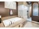 Spa-like bathroom with walk-in shower and soaking tub at 9887 E Edgestone Dr, Scottsdale, AZ 85255