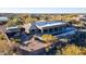 An aerial view of the house, pool, and surrounding area at 10400 E Breathless Ave, Gold Canyon, AZ 85118