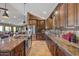 Modern kitchen with granite countertops and dark wood cabinetry at 10400 E Breathless Ave, Gold Canyon, AZ 85118