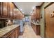 Laundry room with ample cabinetry and built in workspace at 10400 E Breathless Ave, Gold Canyon, AZ 85118