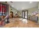 Living room with tile floors, southwestern decor, and access to other rooms at 10400 E Breathless Ave, Gold Canyon, AZ 85118