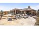 Luxury pool area with lounge chairs and tile flooring at 10400 E Breathless Ave, Gold Canyon, AZ 85118