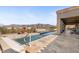 Lap pool with expansive mountain views and a spacious patio at 10400 E Breathless Ave, Gold Canyon, AZ 85118