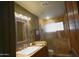 Clean bathroom, featuring a large mirror and a shower stall at 10400 E Breathless Ave, Gold Canyon, AZ 85118