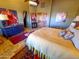 Spacious bedroom with large bed and ensuite access at 10400 E Breathless Ave, Gold Canyon, AZ 85118