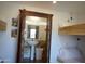 Small bathroom with pedestal sink and shower, accessible from bunk room at 10400 E Breathless Ave, Gold Canyon, AZ 85118