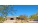 House exterior with two-car garage and desert landscaping at 10400 E Breathless Ave, Gold Canyon, AZ 85118