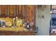 Kitchen counter with granite top, wine glasses, and bottle at 10400 E Breathless Ave, Gold Canyon, AZ 85118