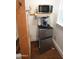 Small kitchenette with microwave, coffee maker, and mini-fridge at 10400 E Breathless Ave, Gold Canyon, AZ 85118