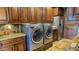 Laundry room with washer, dryer, and granite countertop at 10400 E Breathless Ave, Gold Canyon, AZ 85118