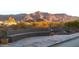 Stone patio with seating area and mountain views at 10400 E Breathless Ave, Gold Canyon, AZ 85118