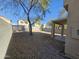 Small backyard with gravel and a covered patio at 11410 W Cocopah St, Avondale, AZ 85323