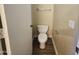 Small bathroom with toilet and wood-look floors at 11410 W Cocopah St, Avondale, AZ 85323