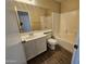 Bathroom with single vanity, toilet, and tub shower combo at 11410 W Cocopah St, Avondale, AZ 85323