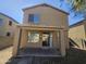 Two story house exterior view, showing backyard and patio at 11410 W Cocopah St, Avondale, AZ 85323