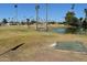 Peaceful golf course with a pond and putting green at 120 N Val Vista Dr # 202, Mesa, AZ 85213