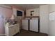 Laundry room with washer, dryer, and ample storage at 120 N Val Vista Dr # 202, Mesa, AZ 85213