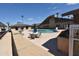 Community pool with tables, chairs, and BBQ at 120 N Val Vista Dr # 202, Mesa, AZ 85213