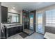 Bathroom with walk-in shower, soaking tub, and double vanity at 12312 E Poinsettia Dr, Scottsdale, AZ 85259