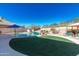 Expansive backyard with a kidney-shaped pool at 12312 E Poinsettia Dr, Scottsdale, AZ 85259