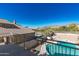 Luxury backyard oasis with a sparkling pool and mountain views at 12312 E Poinsettia Dr, Scottsdale, AZ 85259