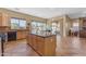 Modern kitchen with large island and stainless steel appliances at 13428 S 186Th Ave, Goodyear, AZ 85338