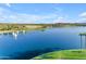 Stunning aerial view of lake with fountains and shoreline at 13428 S 186Th Ave, Goodyear, AZ 85338