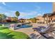 Relaxing pool and spa area with lounge chairs and patio furniture at 13428 S 186Th Ave, Goodyear, AZ 85338