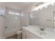 Clean bathroom with a tub, toilet and updated vanity at 1348 E Chilton Dr, Tempe, AZ 85283