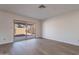 Bright living room with sliding glass doors leading to the backyard at 1348 E Chilton Dr, Tempe, AZ 85283