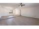 Bright living room featuring hardwood floors and a ceiling fan at 1348 E Chilton Dr, Tempe, AZ 85283