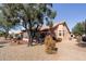 Home exterior with desert landscaping and a screened patio at 14137 W Via Manana --, Sun City West, AZ 85375