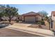 Single story home with a two car garage and desert landscaping at 14137 W Via Manana --, Sun City West, AZ 85375