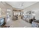 Relaxing living room featuring a comfortable seating arrangement and ample natural light at 14137 W Via Manana --, Sun City West, AZ 85375