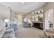 Open living room with a view into the kitchen and access to the front entry at 14137 W Via Manana --, Sun City West, AZ 85375