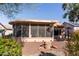 Screened patio with rock accents and desert plants at 14137 W Via Manana --, Sun City West, AZ 85375