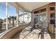 Bright sunroom featuring comfortable lounge chairs and peaceful views at 14137 W Via Manana --, Sun City West, AZ 85375